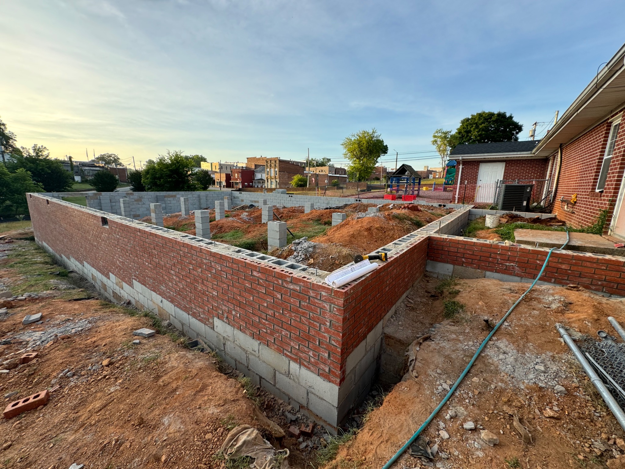Brick and block foundation walls under construction