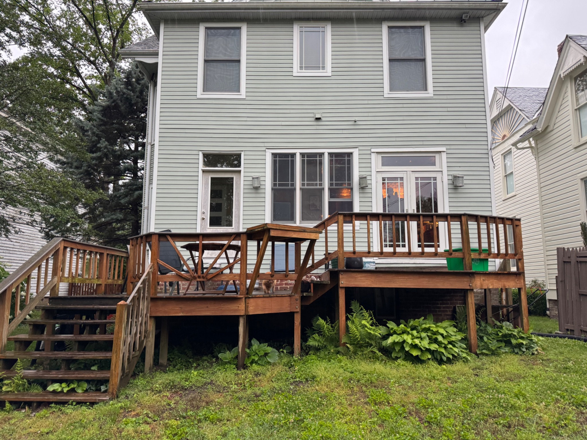 Original rear wood deck before the 600 square foot Balau deck and screened porch project
