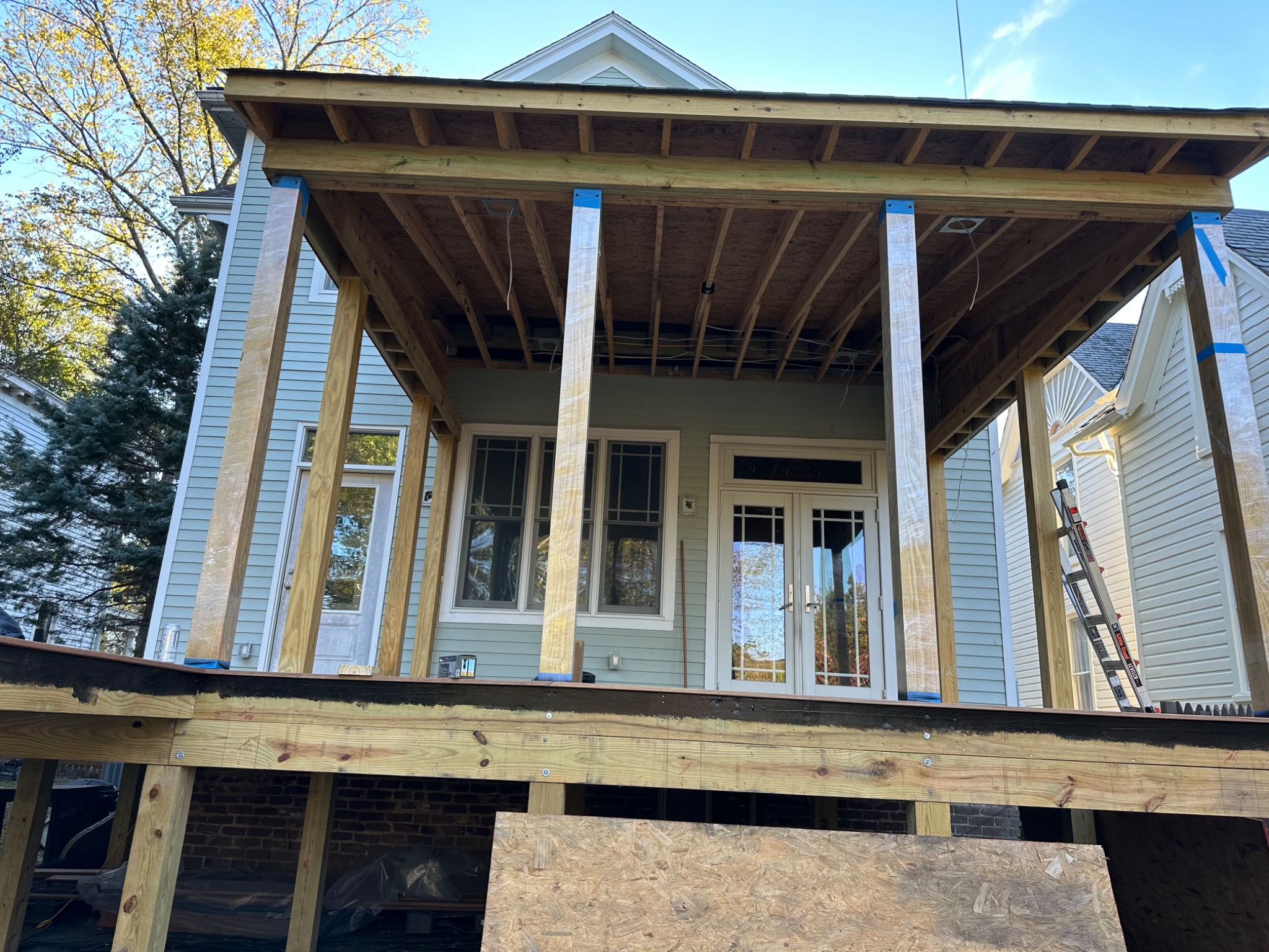 Roof framing and support columns for screened porch