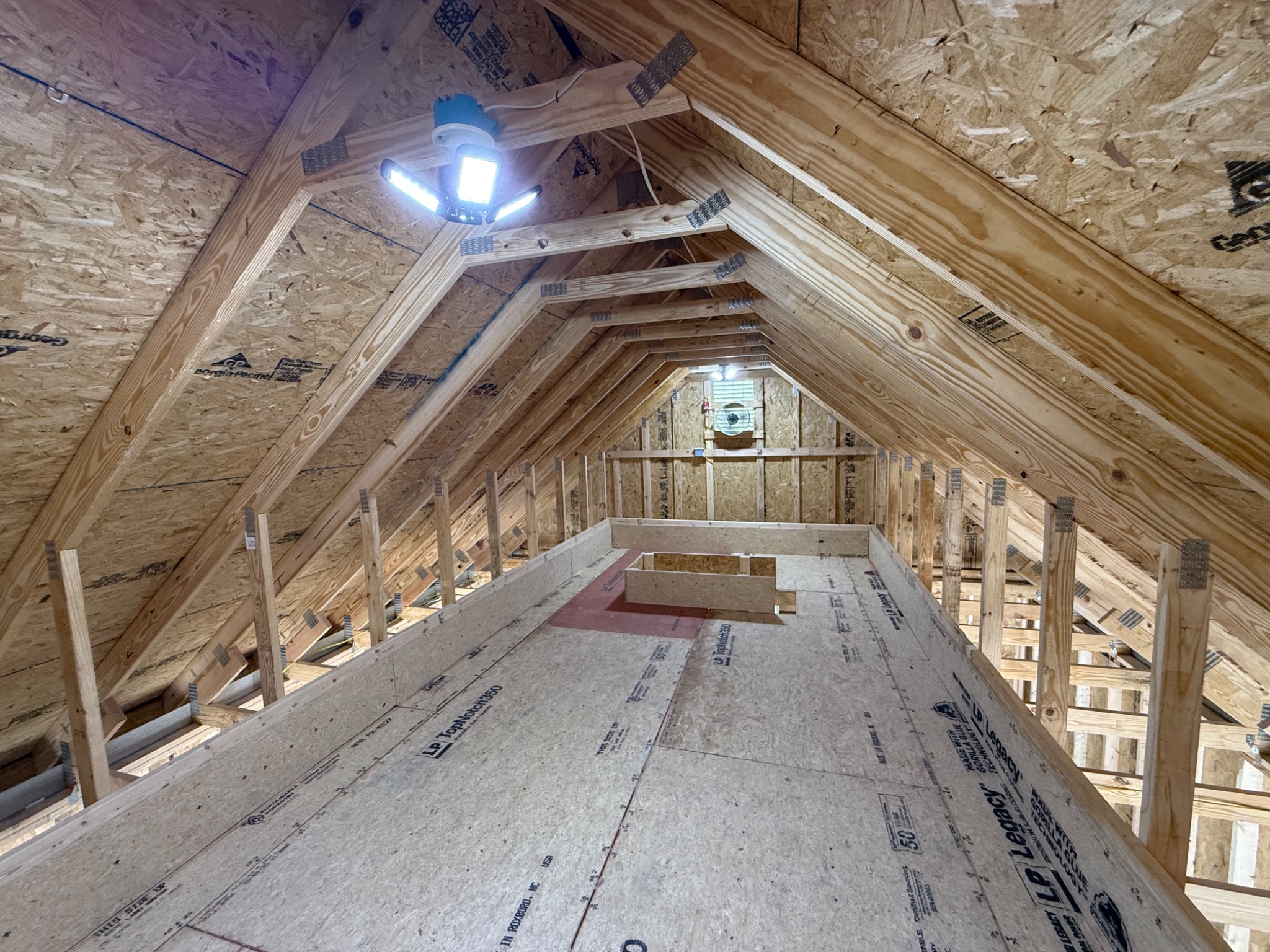 Attic storage area above detached garage