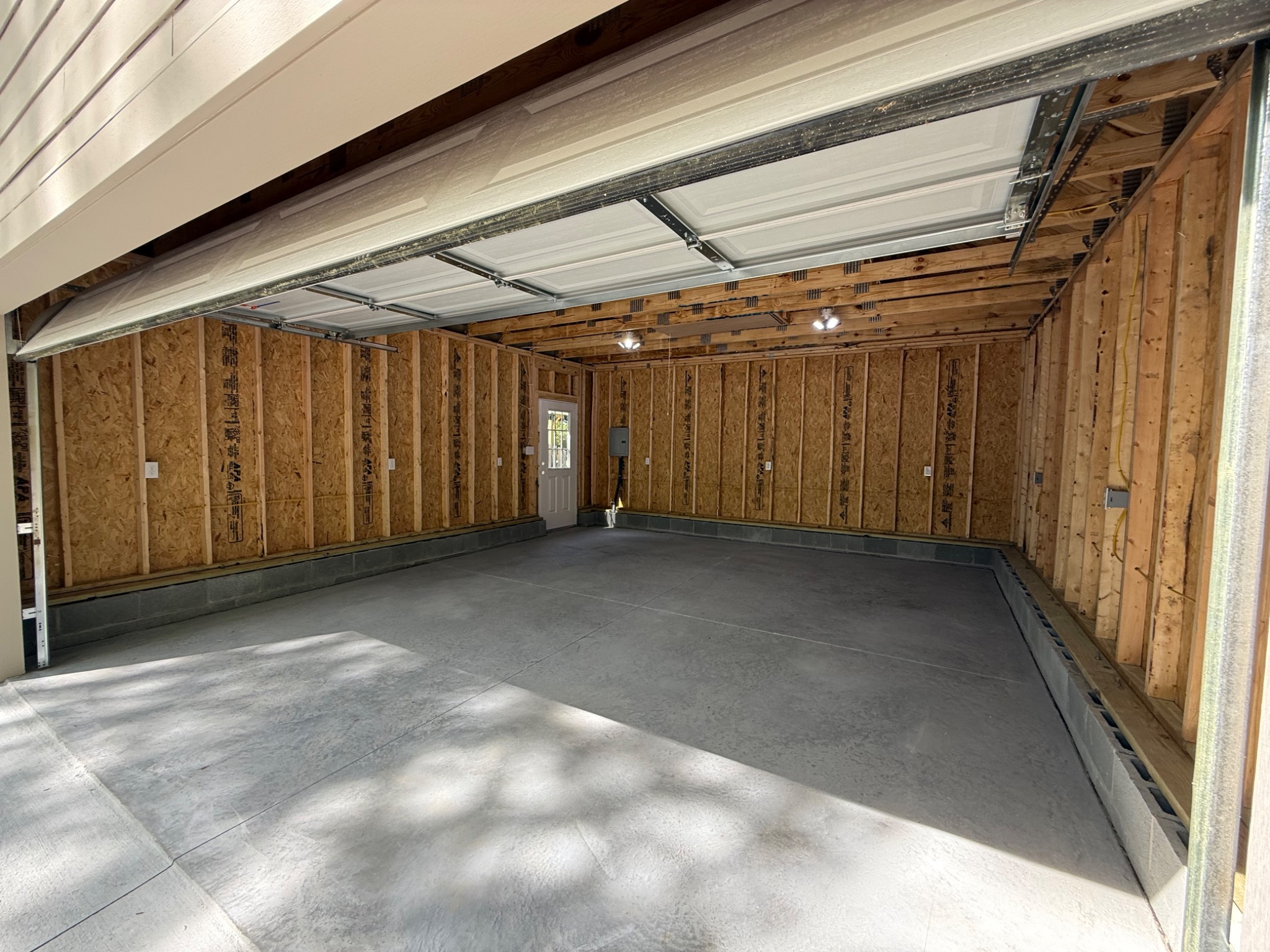 Finished garage slab and framed interior