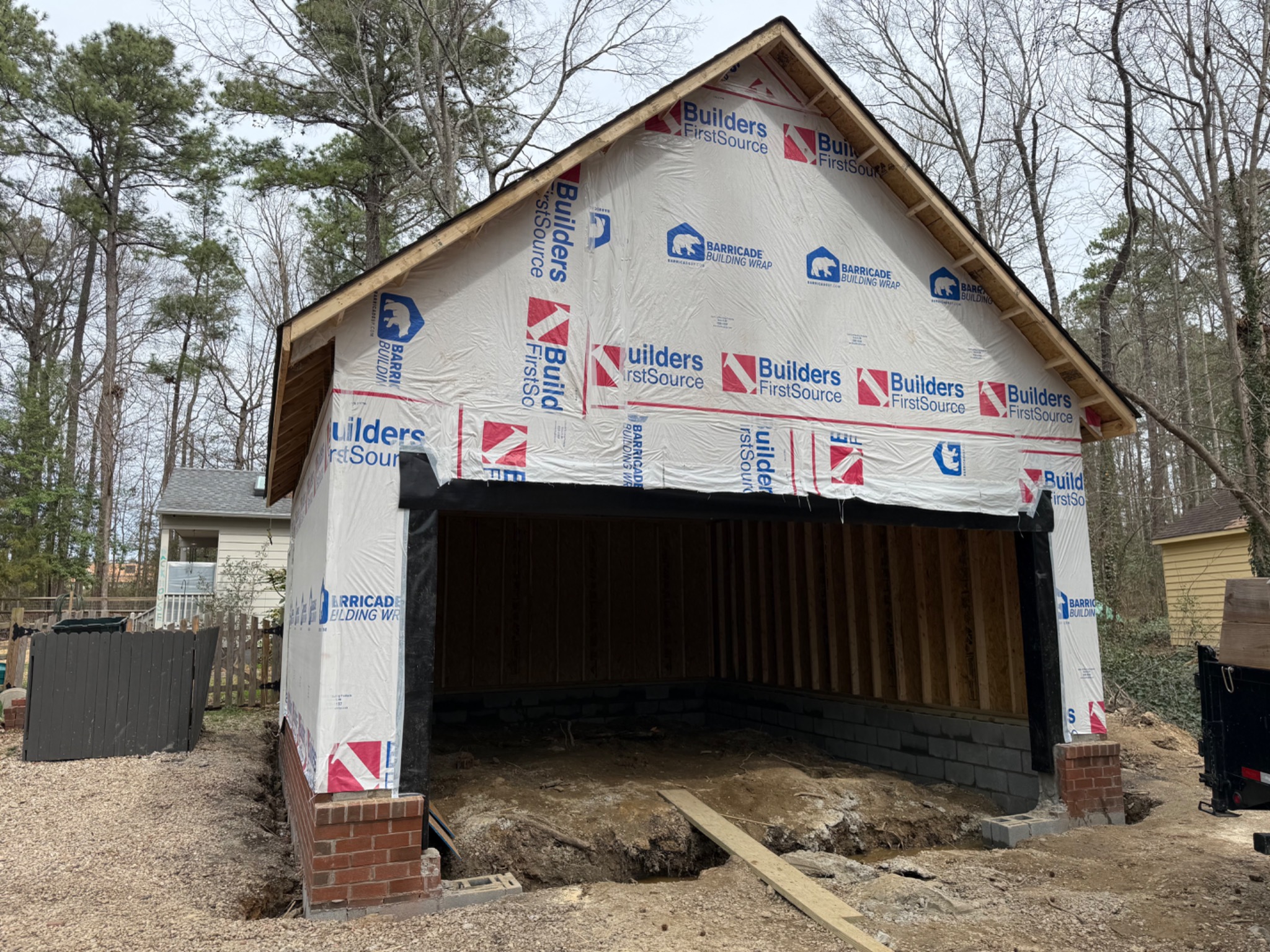 Garage sheathed and wrapped before exterior siding