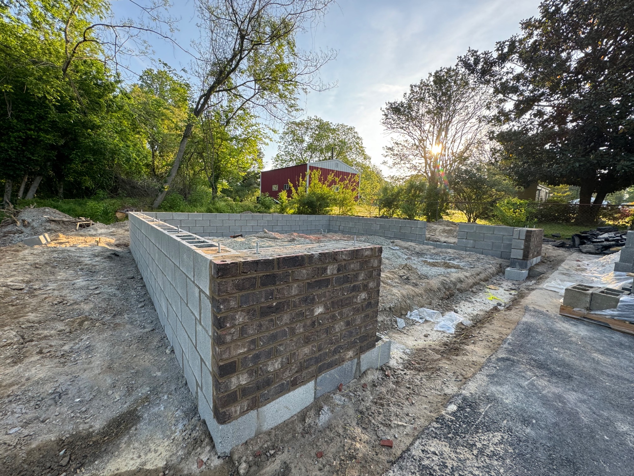 CMU foundation walls with brick veneer corners
