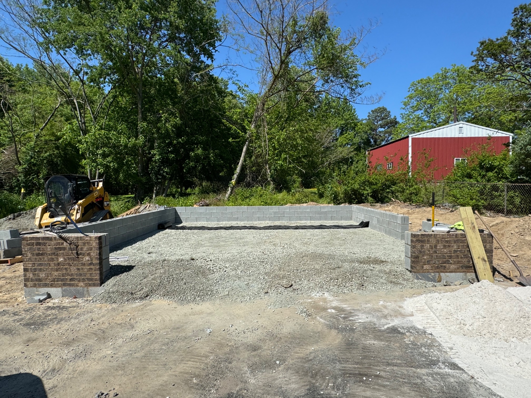 Garage foundation prepared for slab and framing