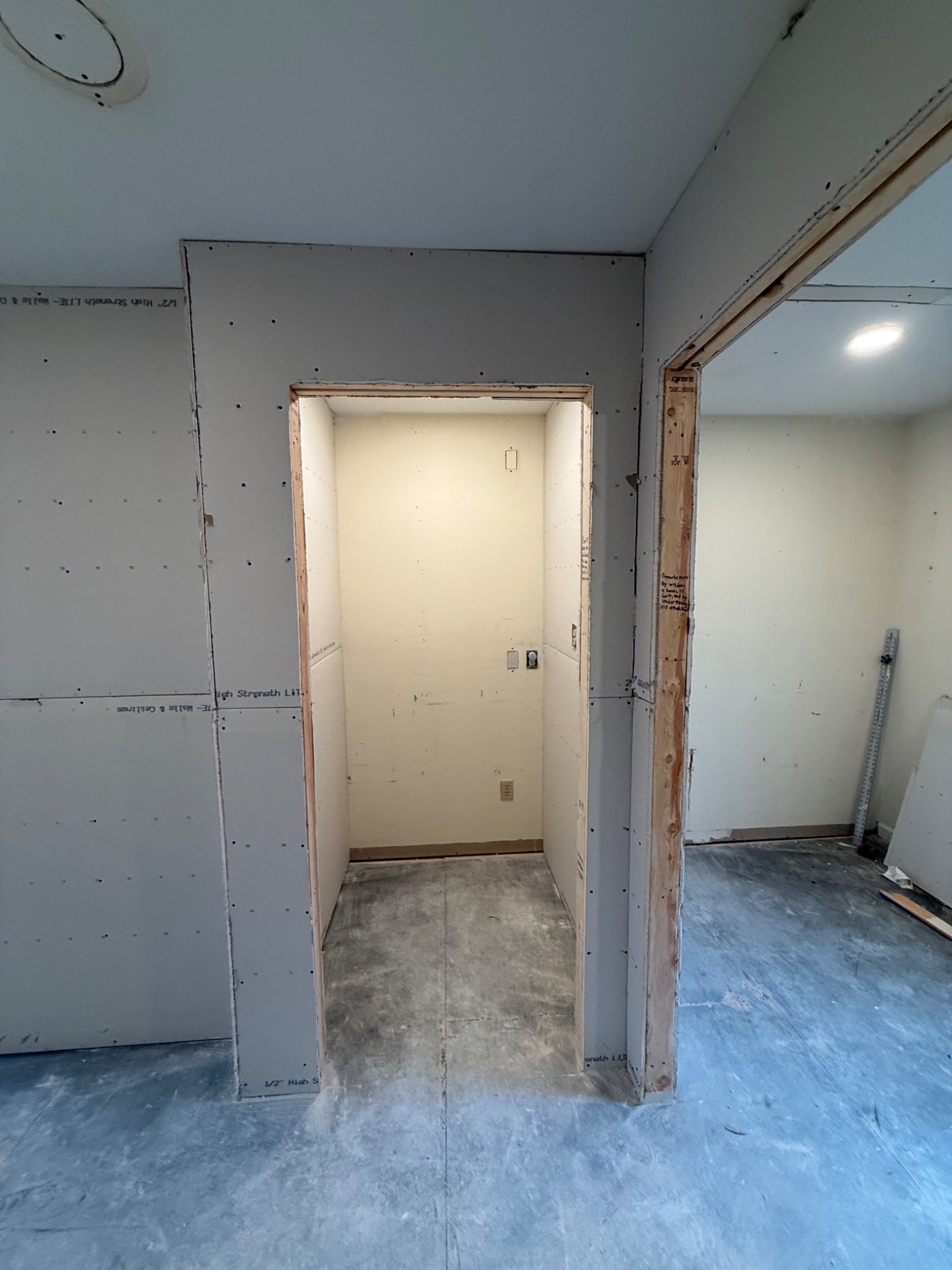 New framed opening and drywall during the storage room to office conversion