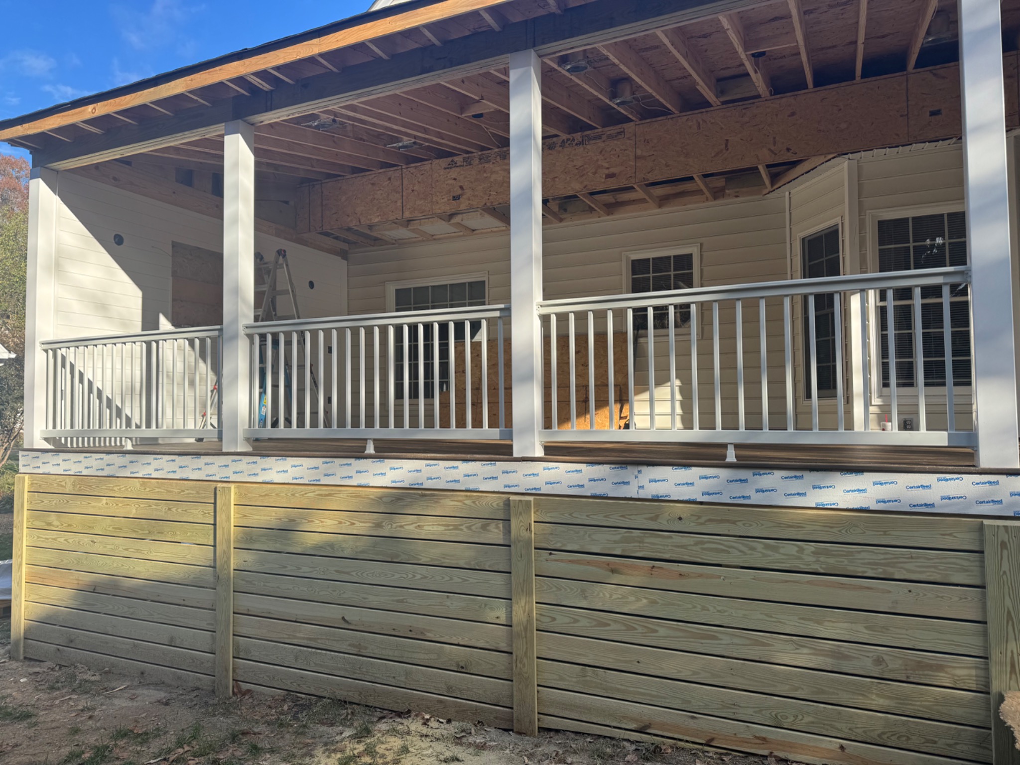 Interior of porch during ceiling and entertainment wall rough-in