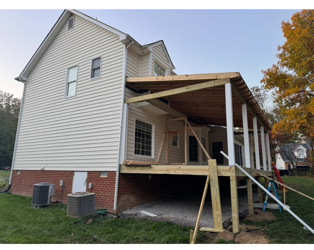 Exterior view of covered porch framing attached to the home