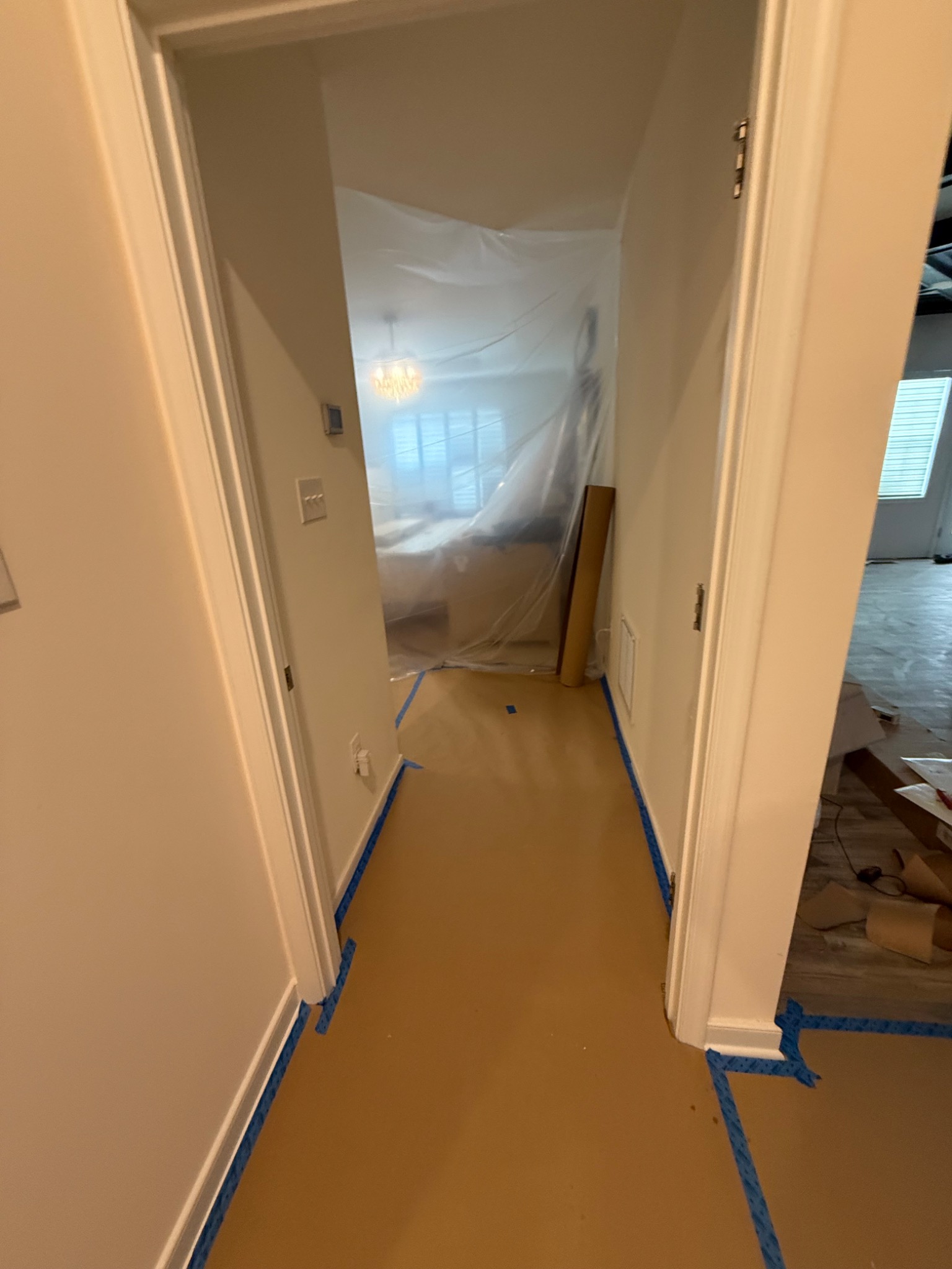 Primary bathroom hallway protected before renovation work