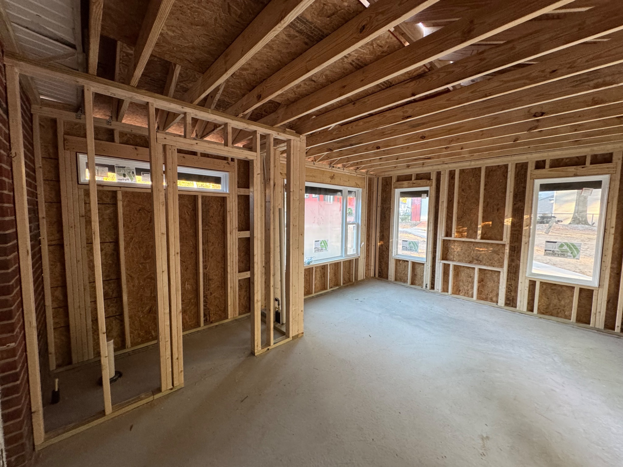 Interior wood framing and new windows in sunroom addition