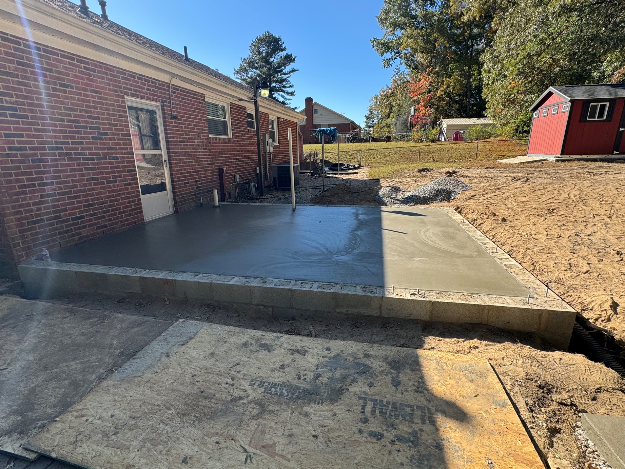 Fresh concrete slab poured for the 460 square foot sunroom addition